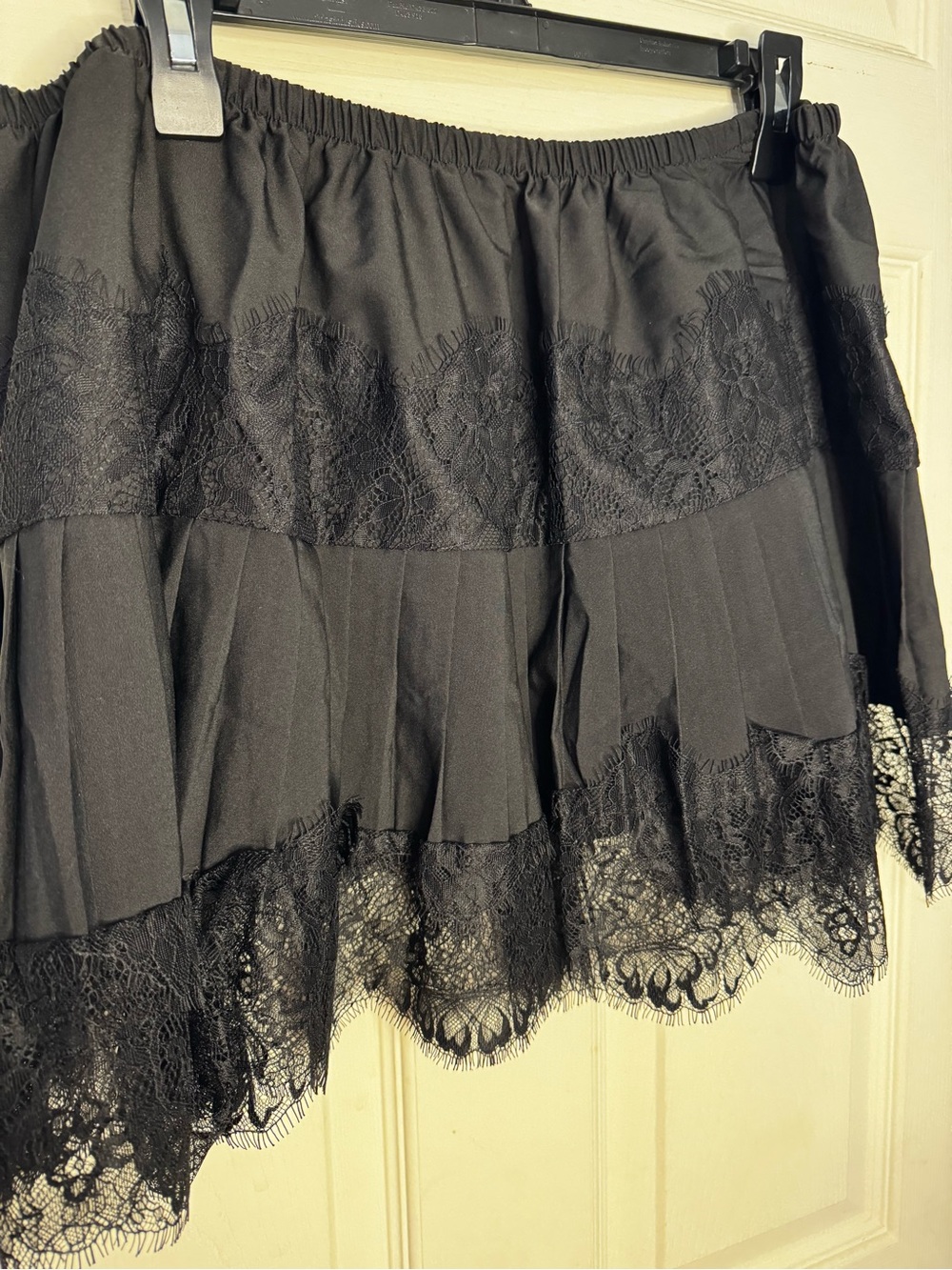 Black Lace Trim Pleated Mini Skirt - Picture 2 of 3
